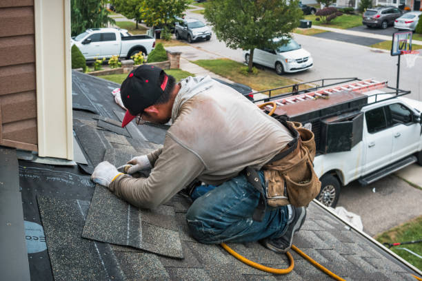 Professional Roofing technician working in Lenox Dale, MA